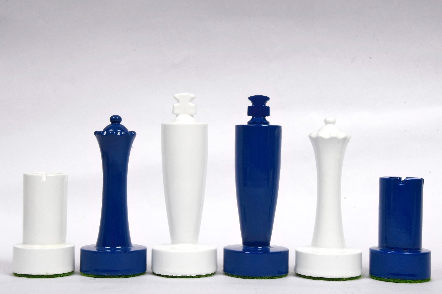 Turned minimalist chess pieces in blue and white paint, 95mm king