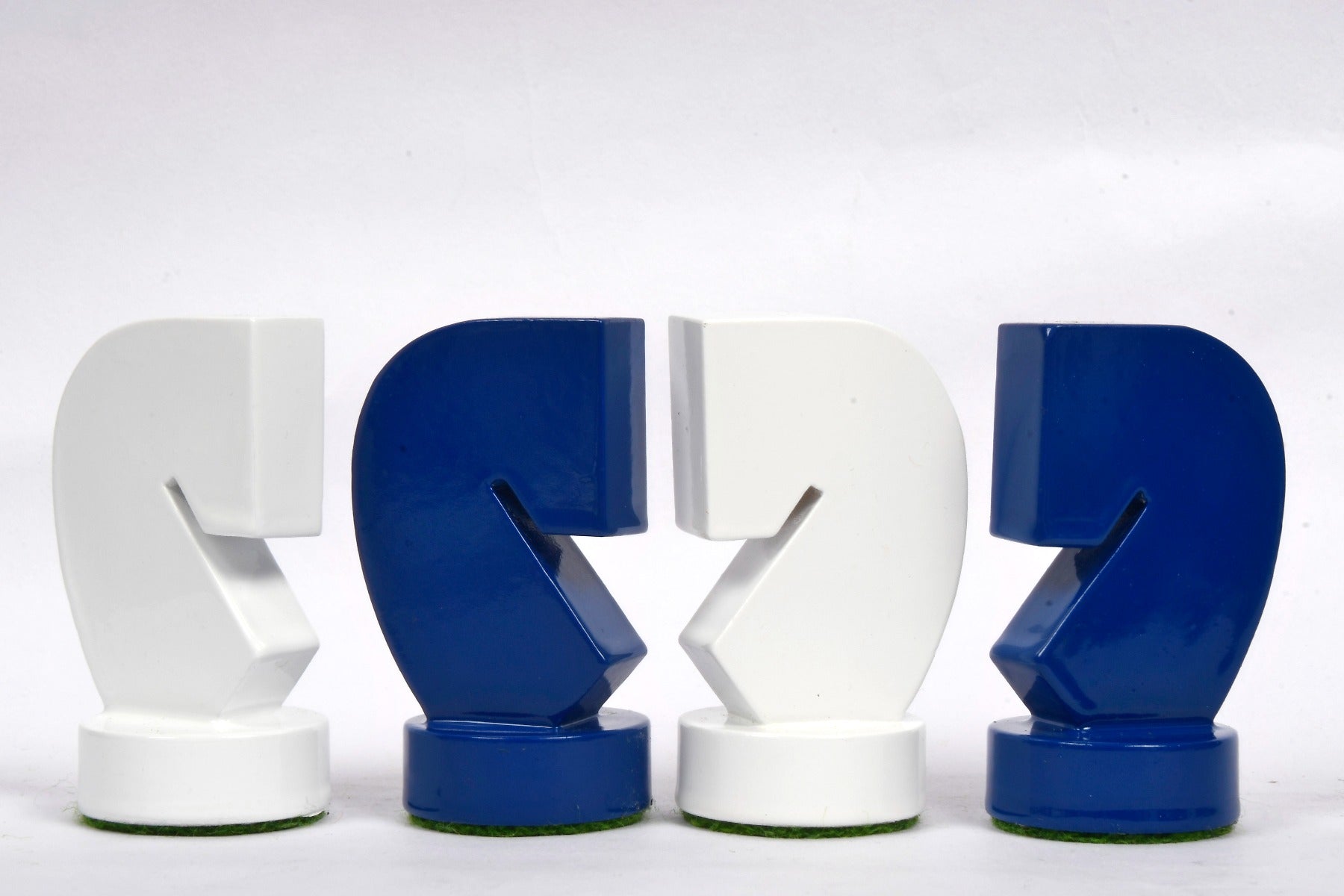 Berliner Minimalist blue and white chess pieces, weighted with felted bases