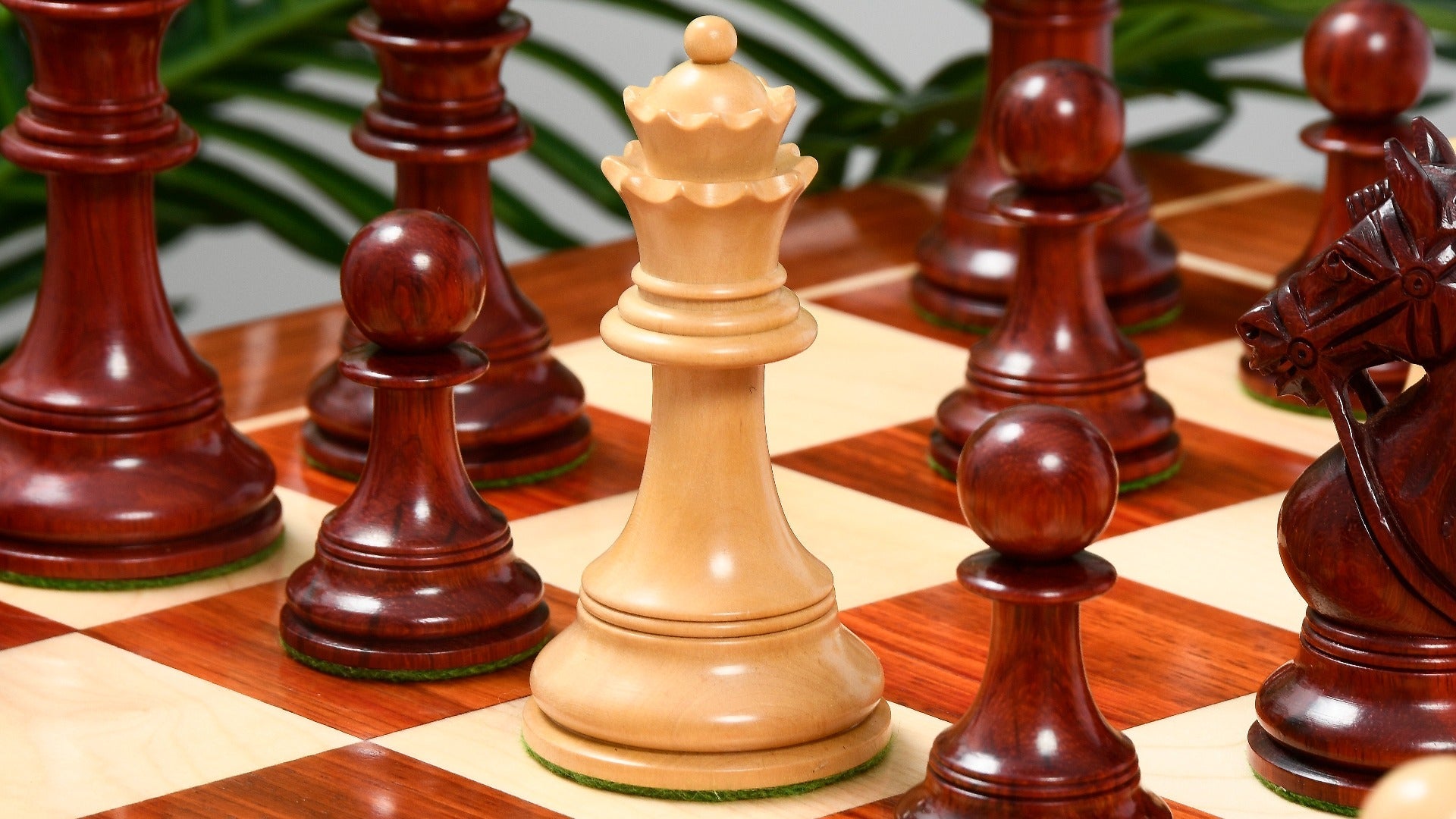 Knight carving detail on the CB Bridle Series Luxury chess set in bud rosewood and boxwood