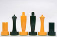 Turned minimalist chess pieces in green and yellow paint, 95mm king