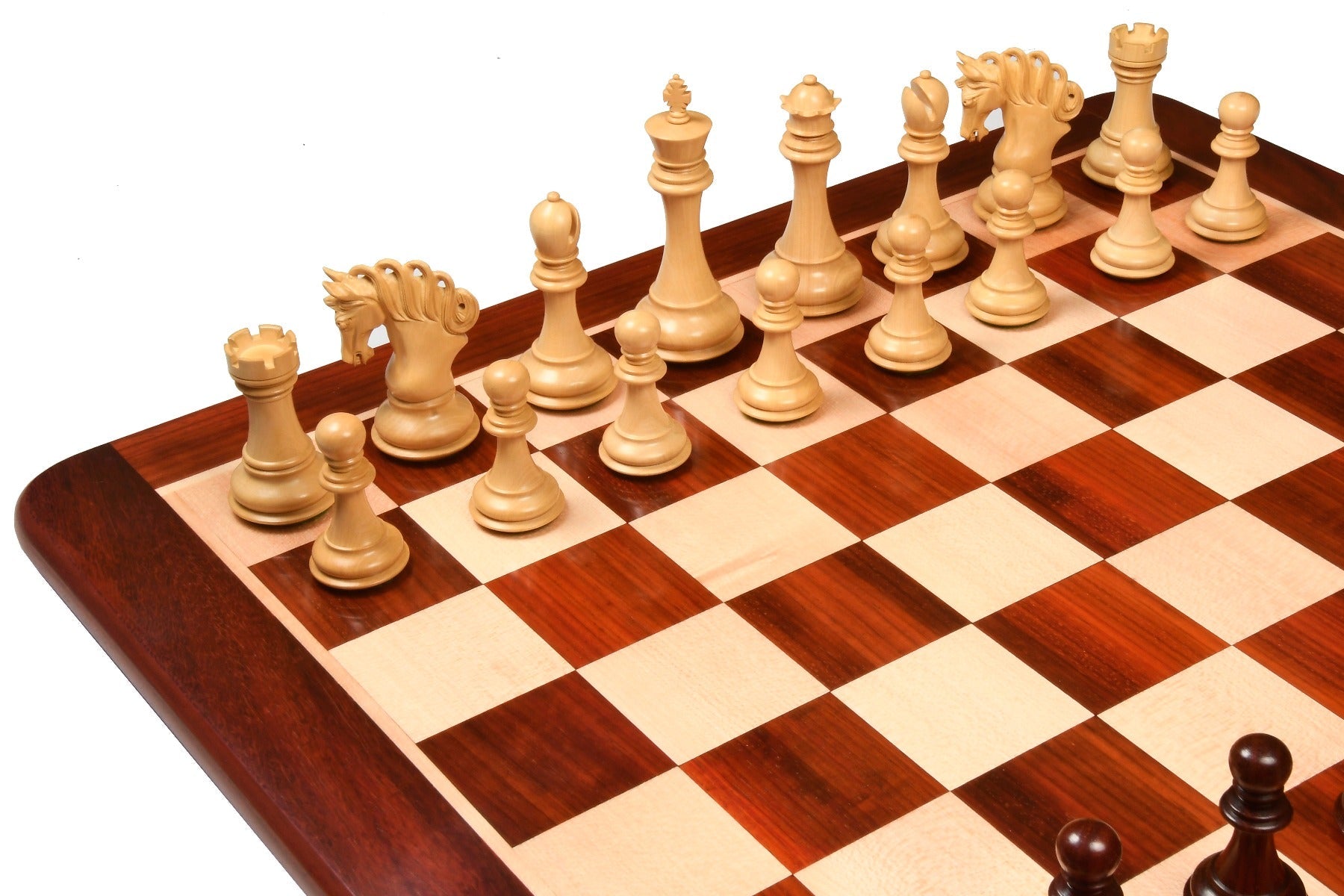 Bud rosewood chess pieces set up for play on the included 58cm solid bud rosewood and maple board