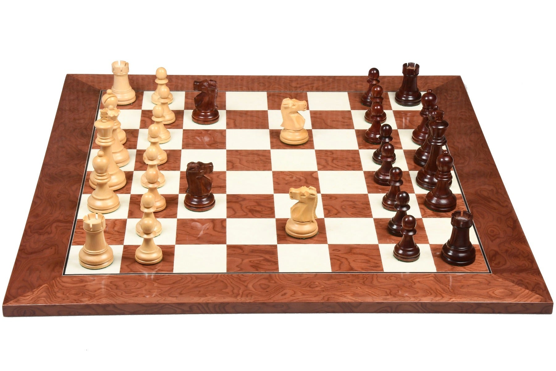 Bud rosewood chess pieces set up for play on the included 55cm red ash burl and maple board