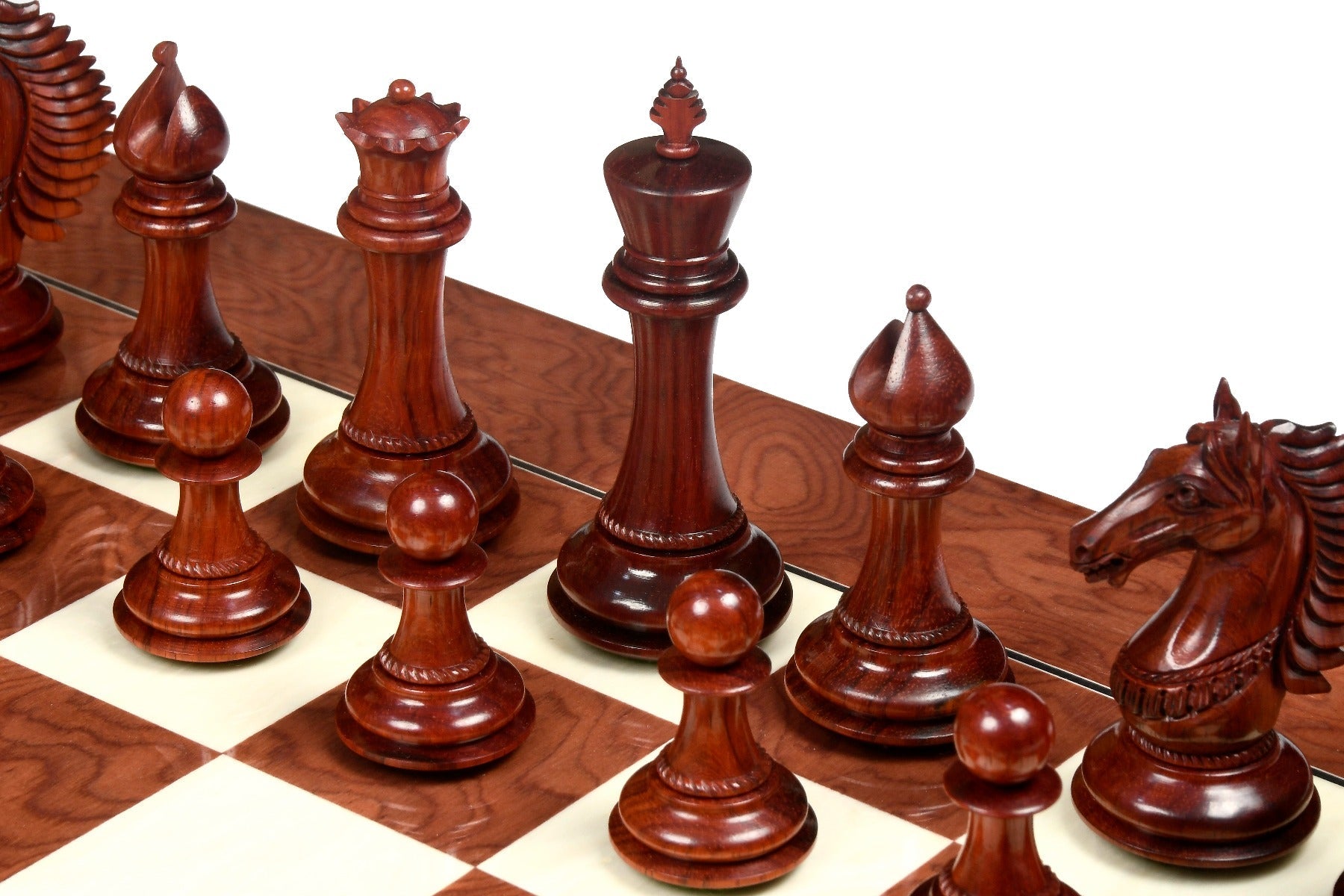 Bud rosewood chess pieces with a 113mm king and weighted felted bases