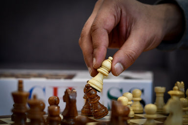Magnetic folding travel chess set with a 2.4 inch king in sheesham and maple