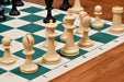 Natural white and black plastic chess pieces with a 97mm king