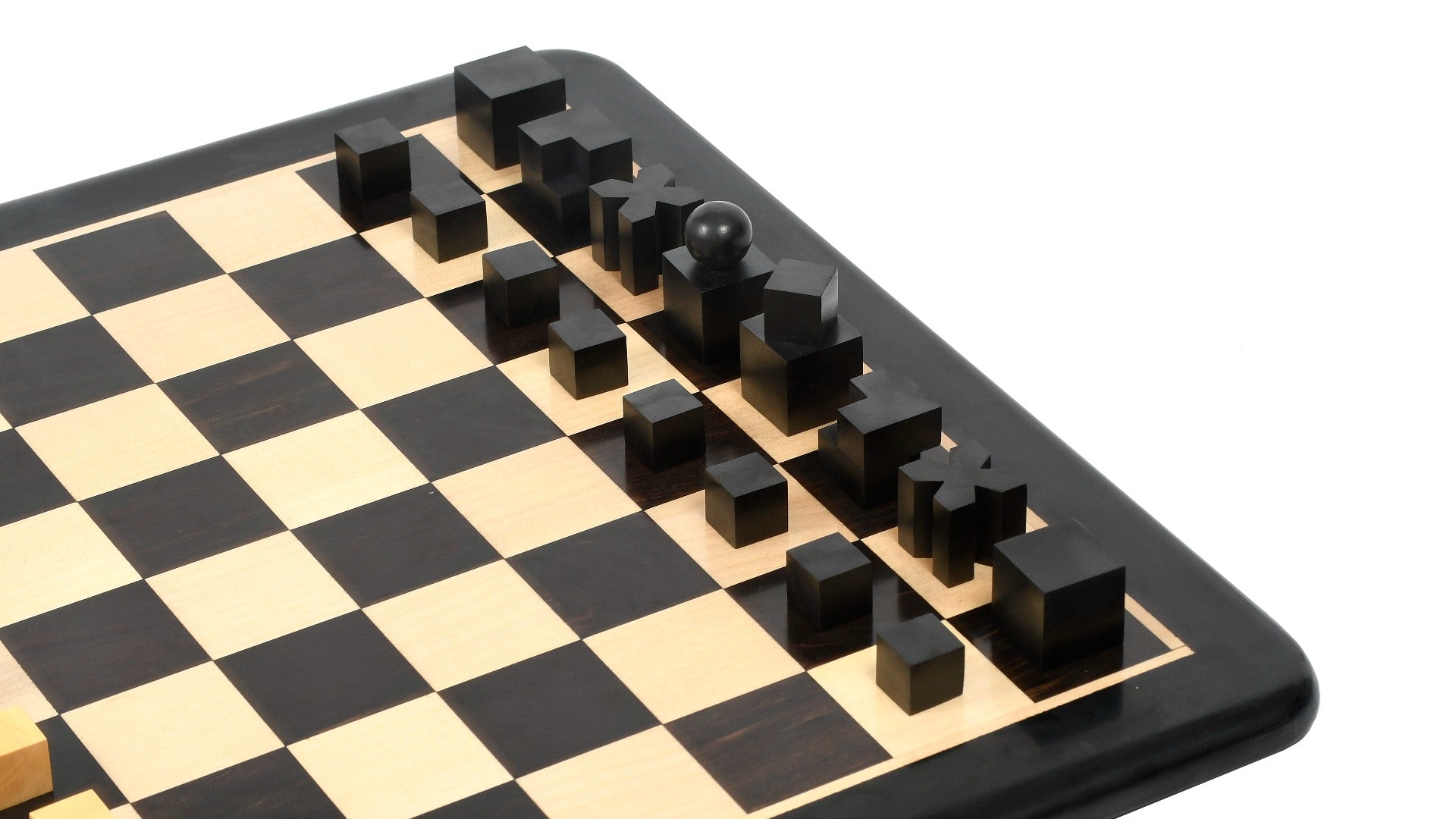 1924 Bauhaus Geometrical chess set, ebonised and natural boxwood, hand carved in India