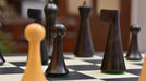 Full Hermann Ohme Minimalist chess set with its 45cm black anigre and maple board, Sterling Chess Australia