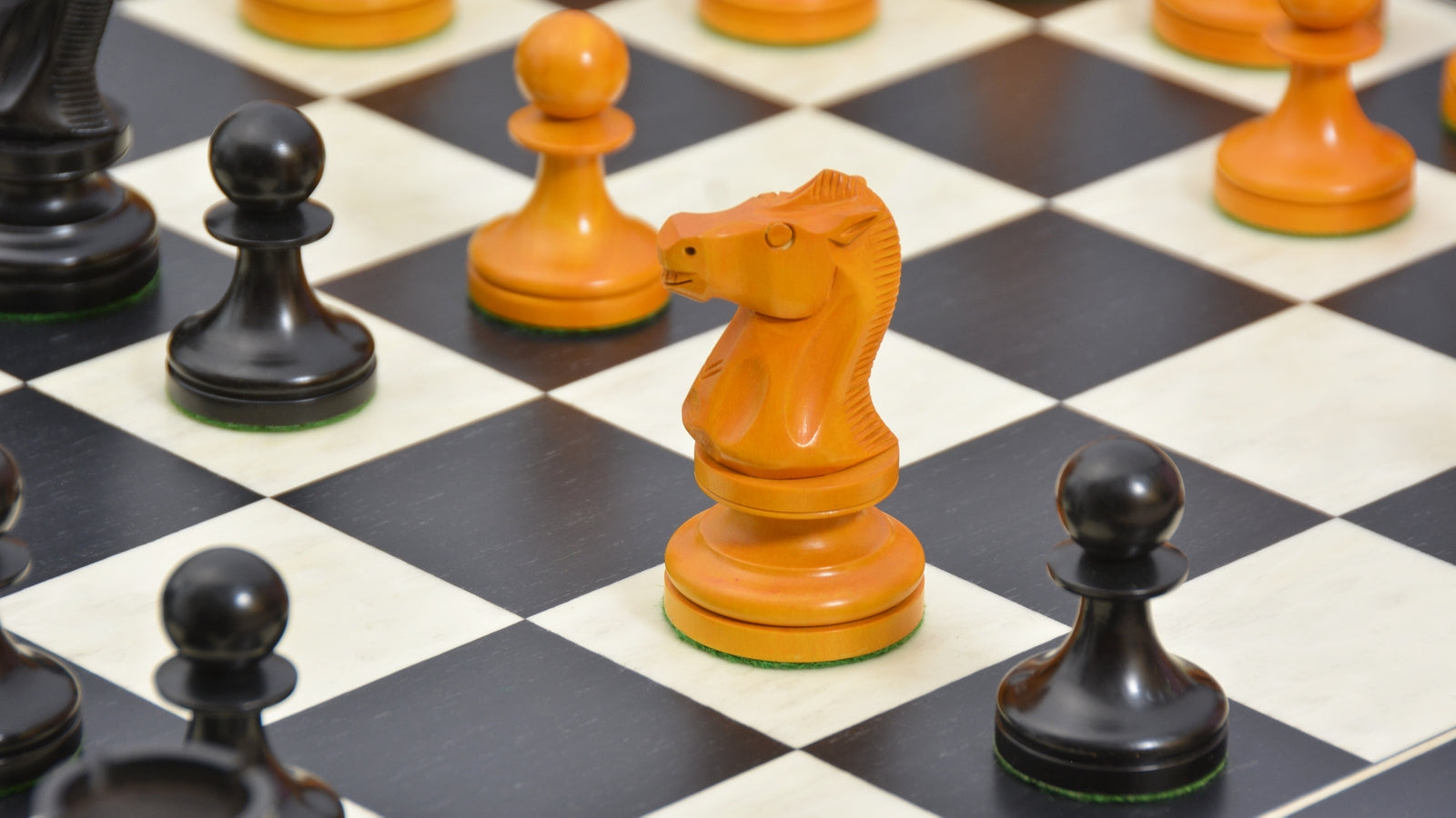 1904 Cambridge Springs Tournament chess set, ebonised and antiqued boxwood, hand carved in India