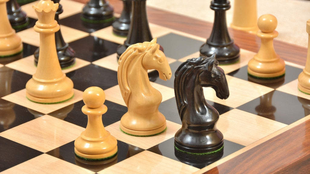 Full 1963 1966 Piatigorsky Cup chess set with its 58cm ebony and maple board with a sheesham border, from Sterling Chess