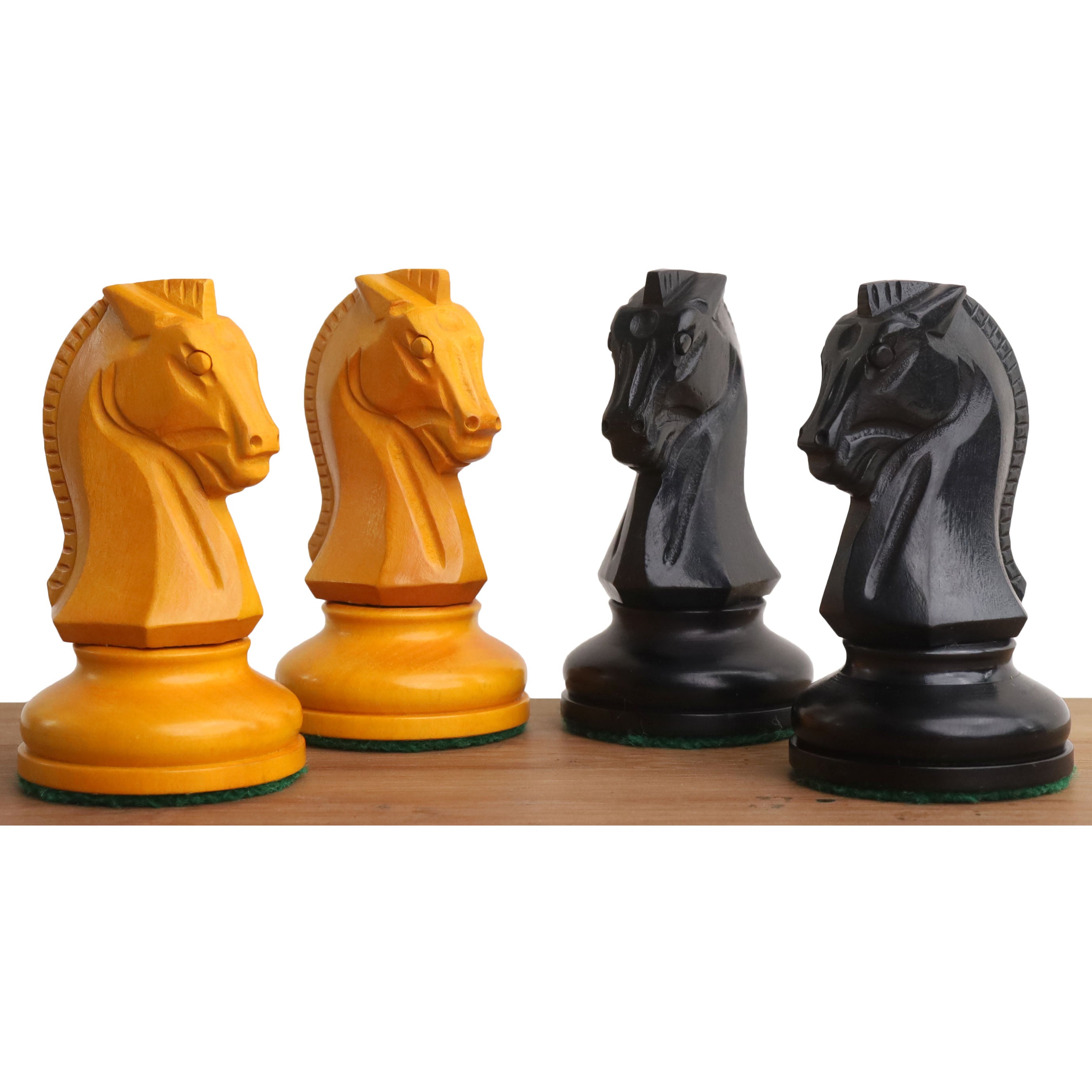 Antiqued and ebonised boxwood Dubrovnik knights compared