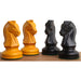 Antiqued and ebonised boxwood Dubrovnik knights compared