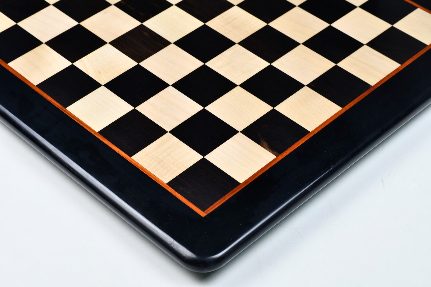 Ebony and maple 18 inch chess board photographed from above