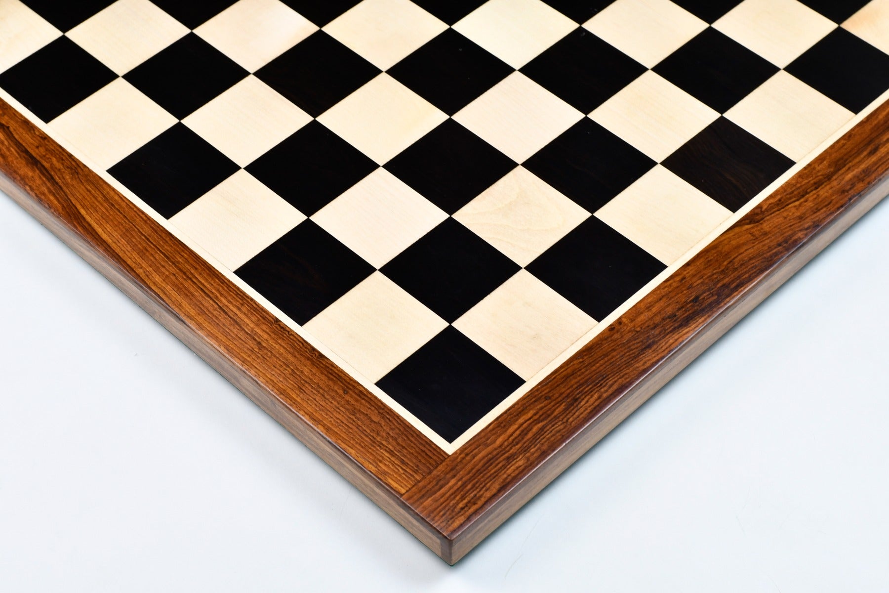 Ebony and maple chess board with a sheesham border, 53cm with 55mm squares