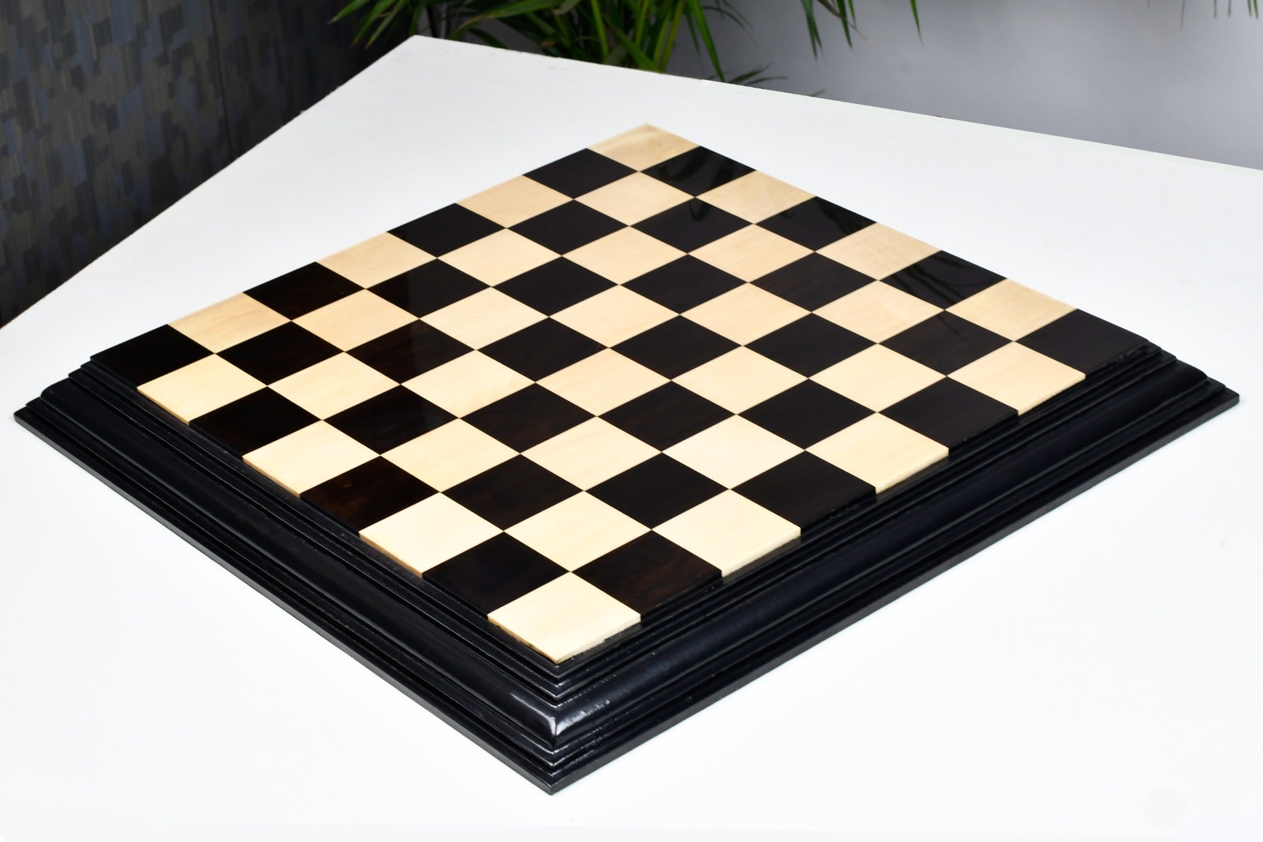Luxury ebony and boxwood chess board at an angle