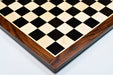Ebony and maple sheesham border chess board at an angle