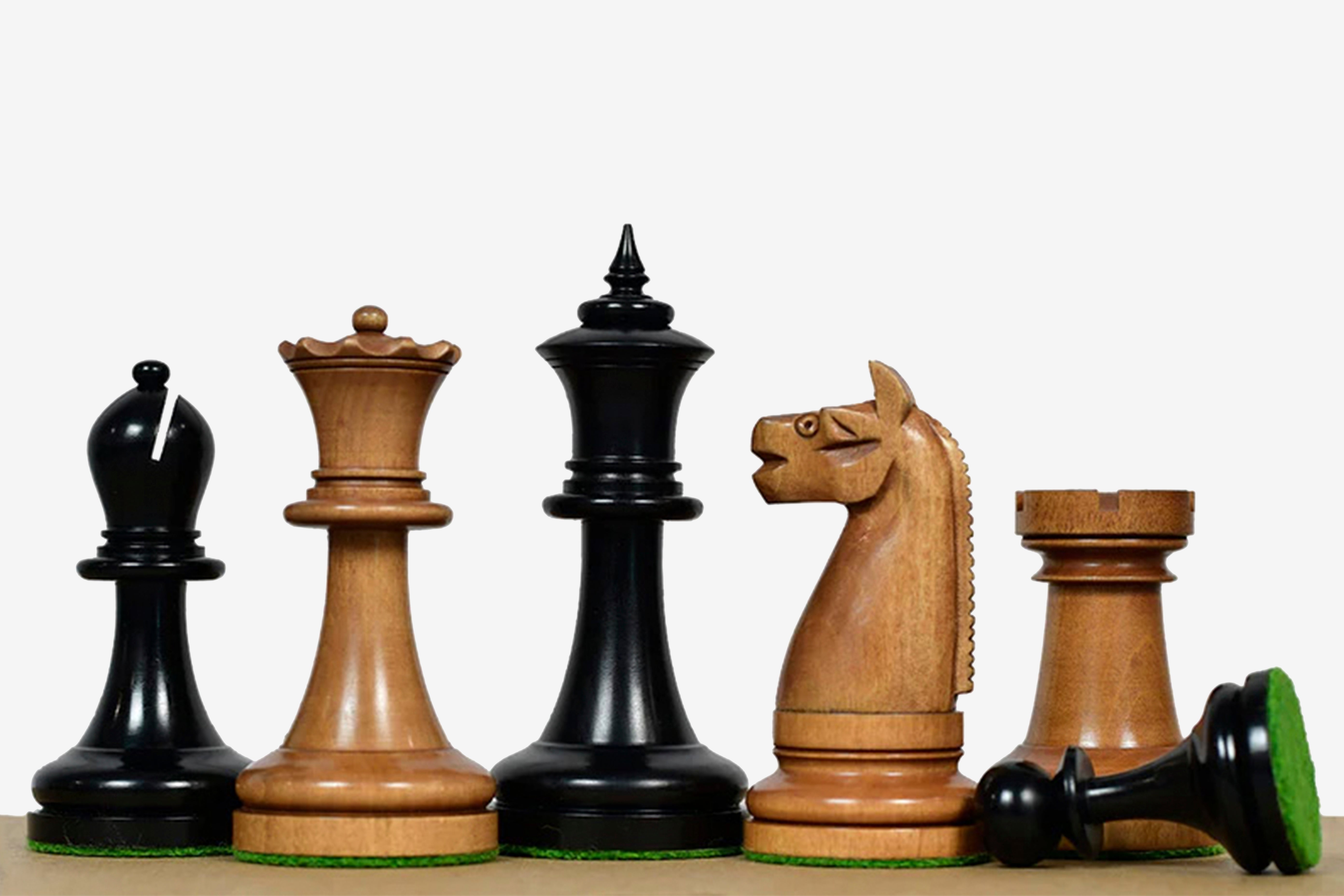 Sterling Chess 1904 American Chess Co. chess pieces in ebonised and antique boxwood, 97mm king