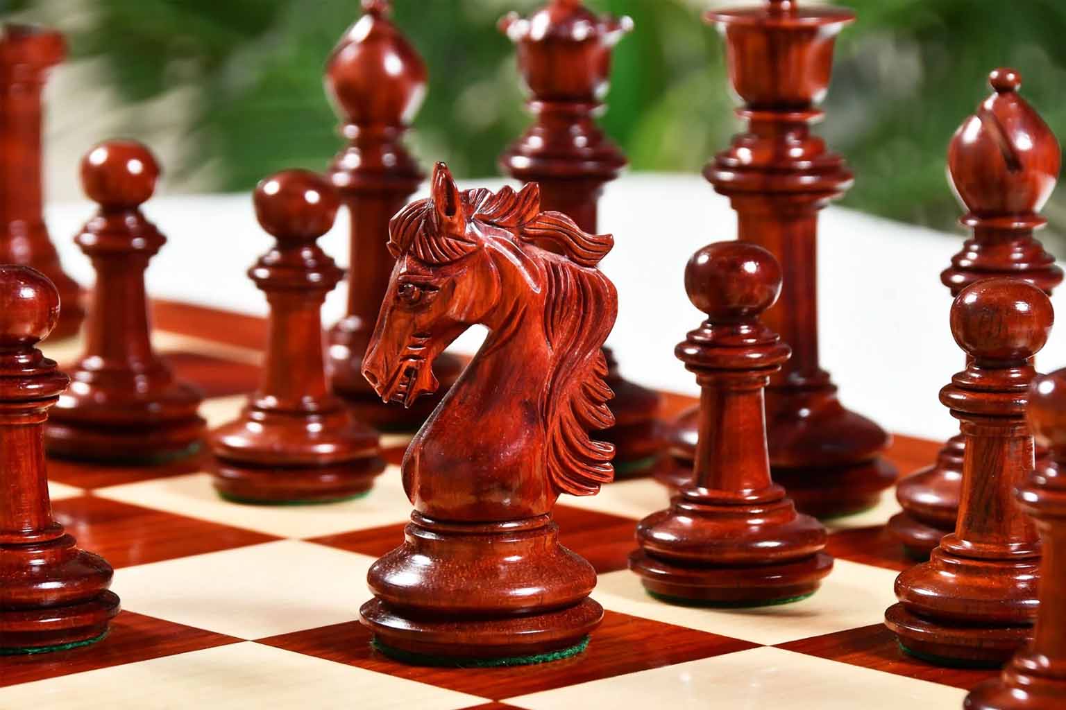 Knight carving detail on the French Warrior Luxury chess pieces in bud rosewood and boxwood