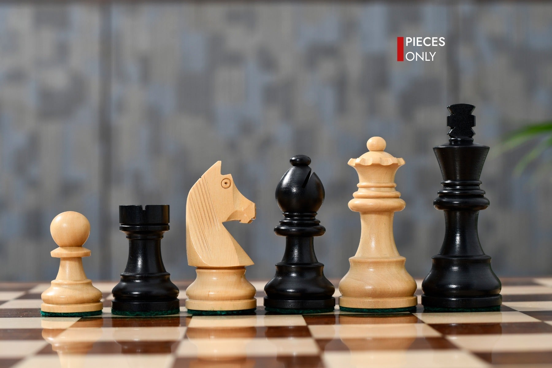 German Knight chess set, ebonised and natural boxwood, hand carved in India