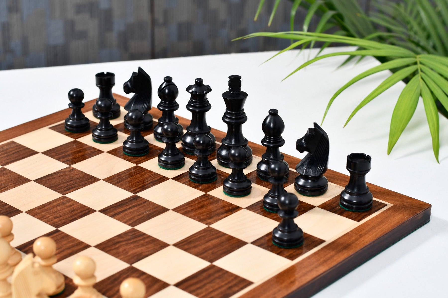 German Knight chess set, 76mm king, Ebonised finish with its 37cm sheesham and boxwood board