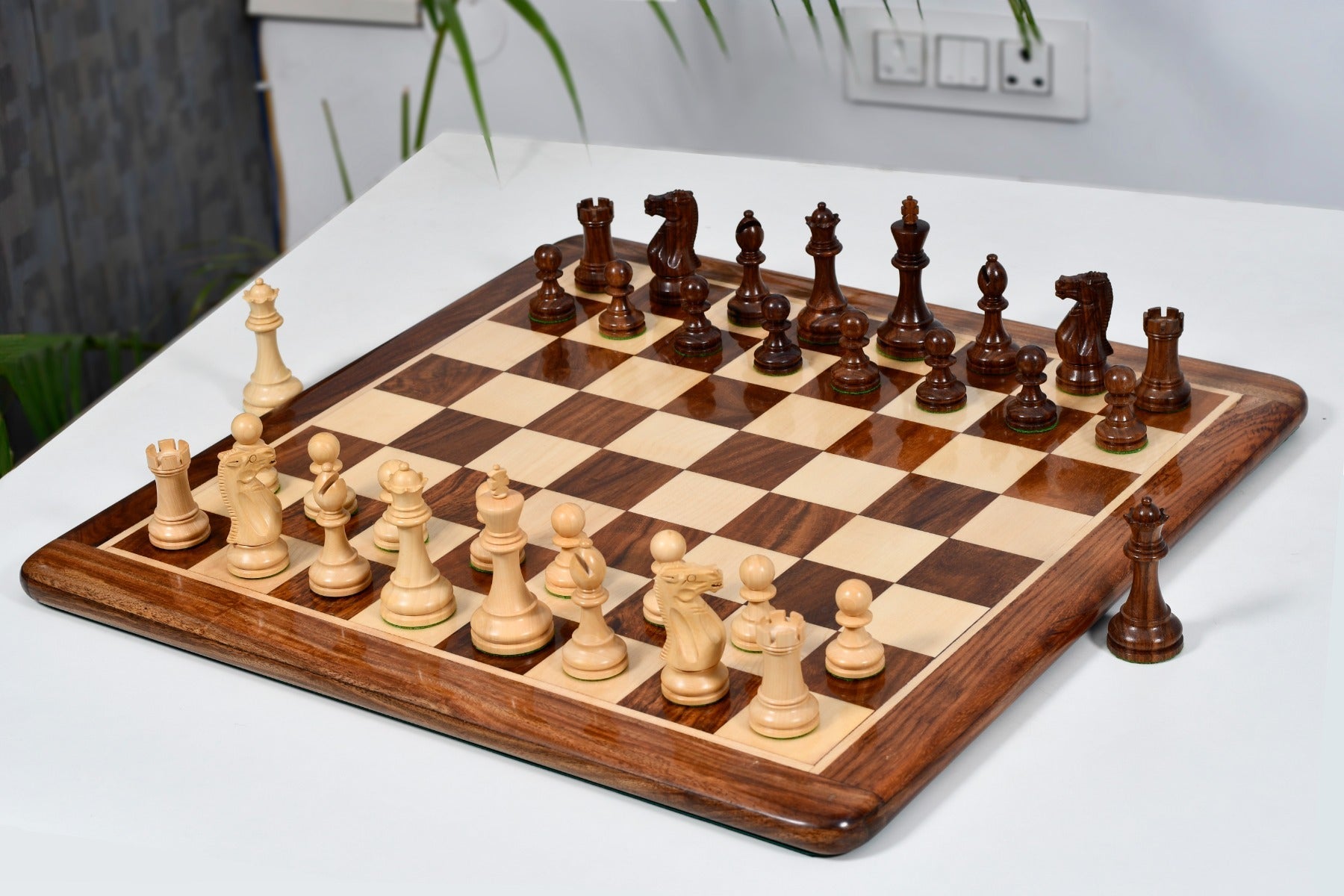 Knight carving detail on the Grandmaster Staunton chess pieces in sheesham and natural boxwood