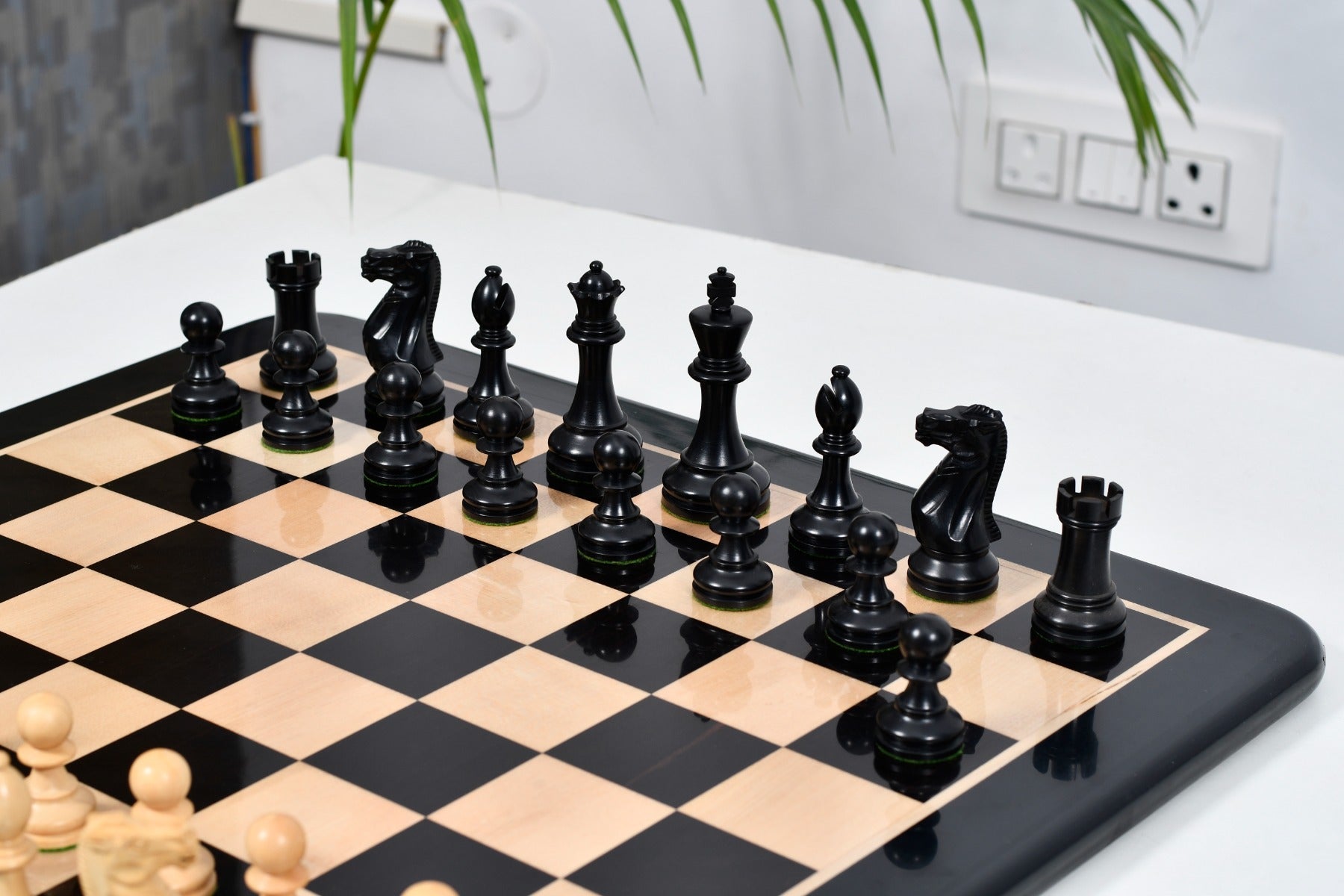Knight carving detail on the Grandmaster Staunton chess pieces in ebonised and natural boxwood