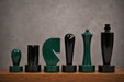 Sterling Chess Berliner Minimalist chess pieces in green and black painted boxwood, 95mm king