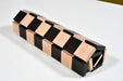 Folding ebony and maple chess board, edge view