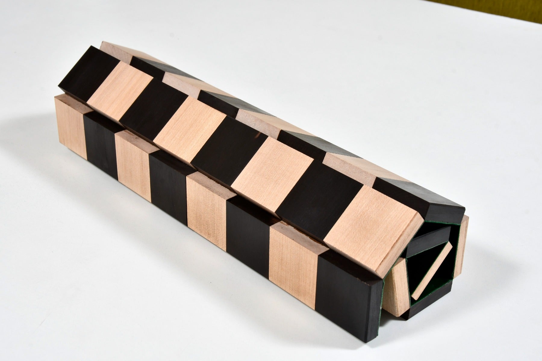 Folding ebony and maple chess board, edge view