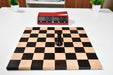 Folding ebony and maple chess board opened flat