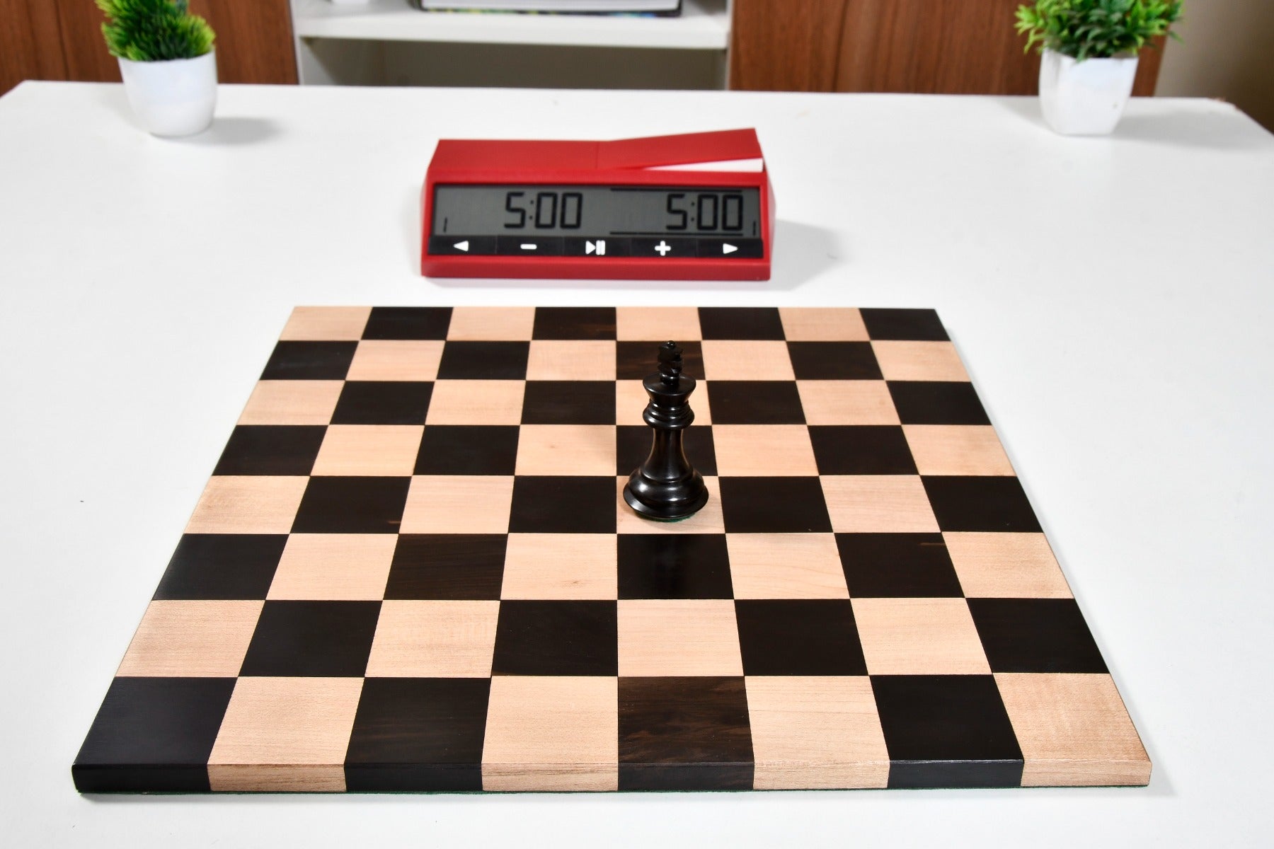 Folding ebony and maple chess board opened flat