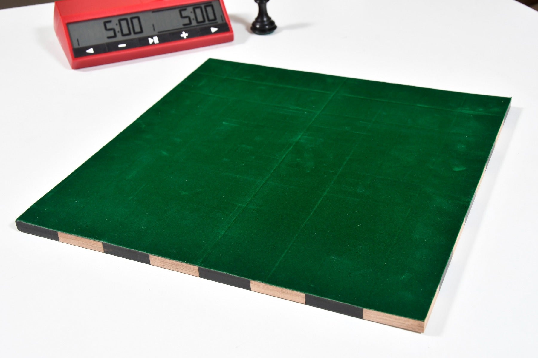 Indian folding ebony and maple chess board, 32cm