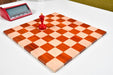 Folding bud rosewood and maple chess board at an angle