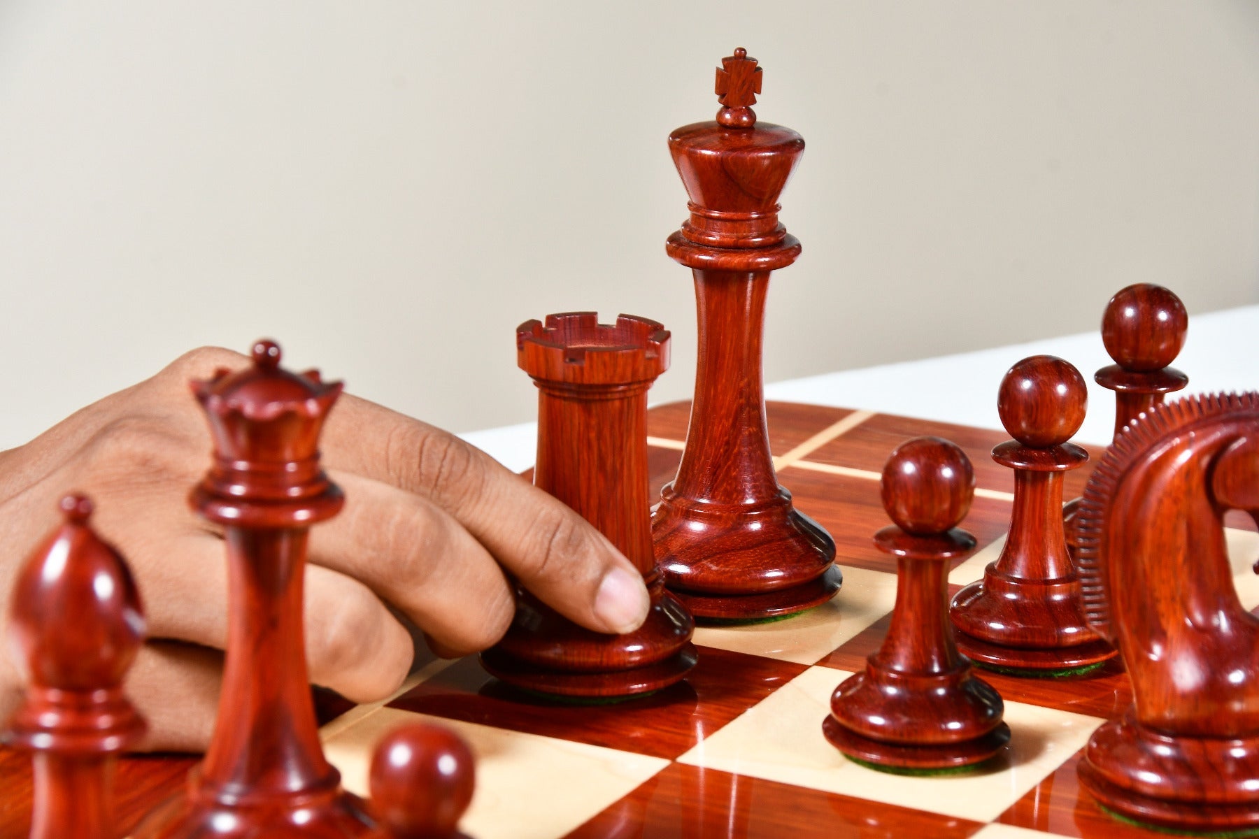 Knight carving detail on the Red Rum Luxury Staunton chess pieces in bud rosewood and boxwood