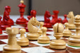 1930 Knubbel Analysis wooden chess pieces, 74mm king, Stained crimson finish