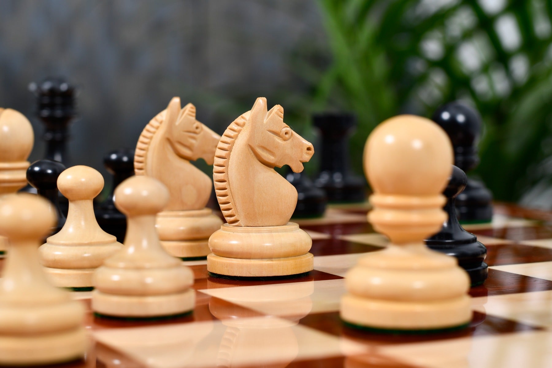 German Knubbel reproduction chess pieces with two spare queens