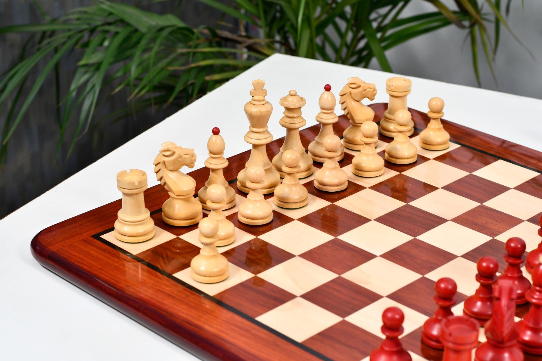 Stained crimson chess pieces with a 99mm king and felted bases