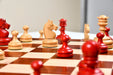 1930 German Knubbel crimson chess set on 45mm squares