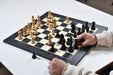 Ebonised boxwood German Knight chess pieces, weighted 96mm king set