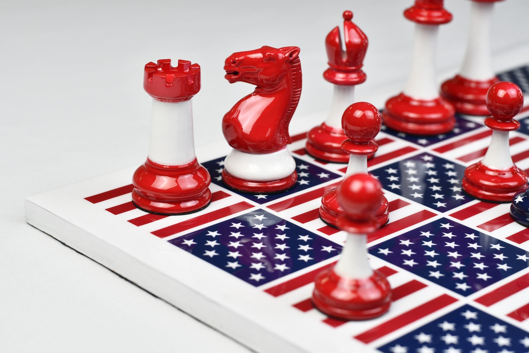 Captain America chess set, 34 painted plastic pieces with two spare queens