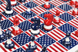 Red and blue painted solid plastic chess pieces, 98mm king