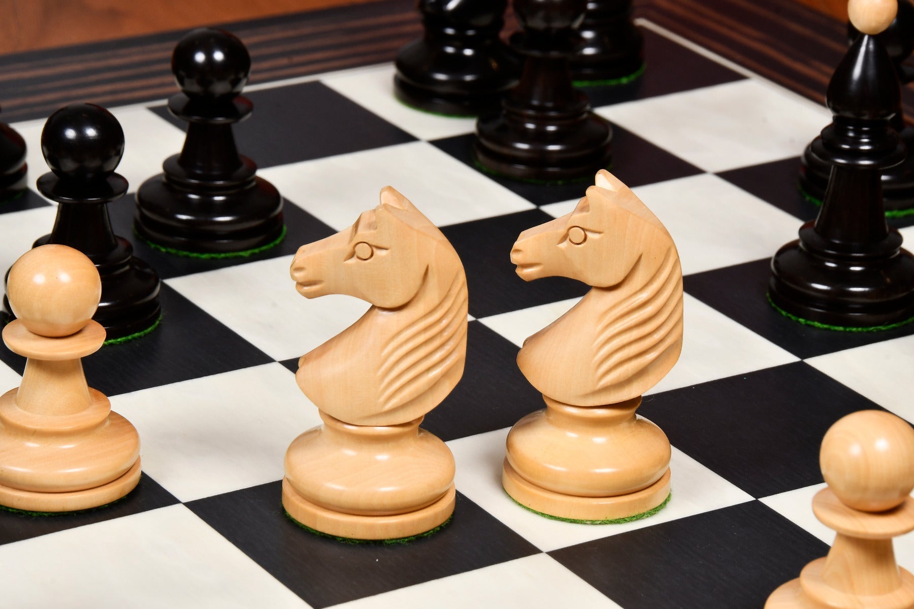Capablanca reproduction chess pieces in natural boxwood and dark ebony, 96mm king