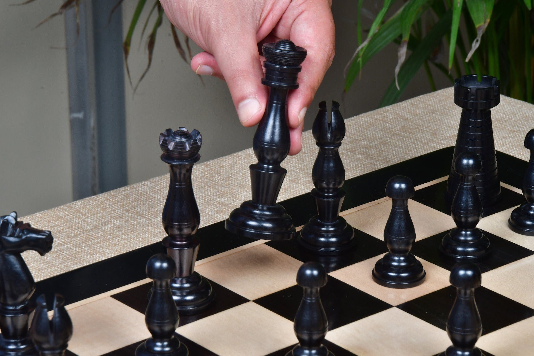 Knight carving detail on the Grand Divan chess pieces in genuine ebony and boxwood