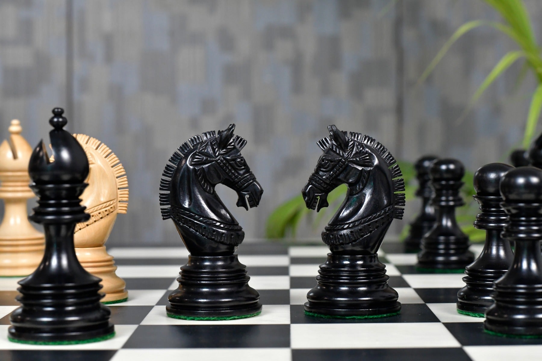 Indian Chetak II ebony chess set arranged on 60mm squares