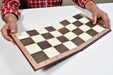 Stained crimson and boxwood analysis chess pieces, 2.91 inch king