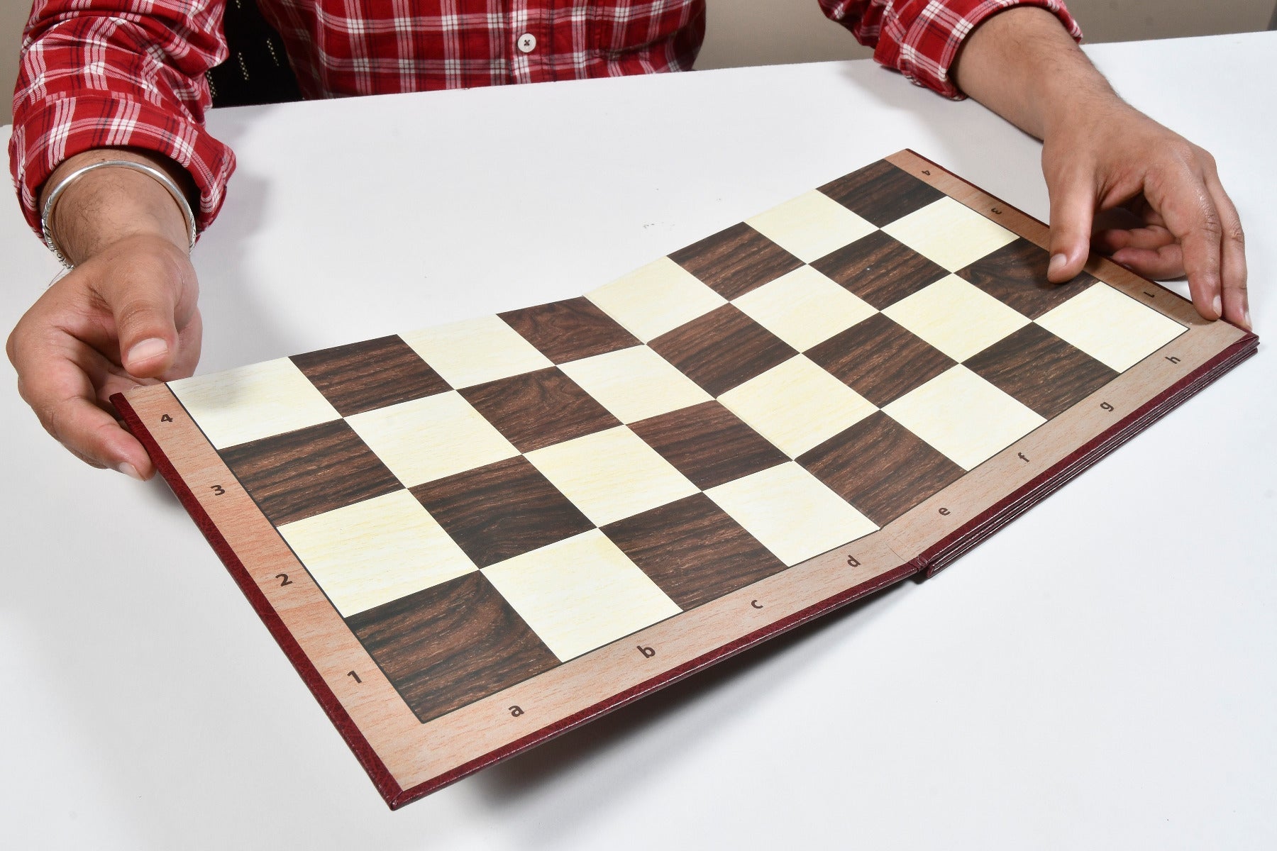 Stained crimson and boxwood analysis chess pieces, 2.91 inch king