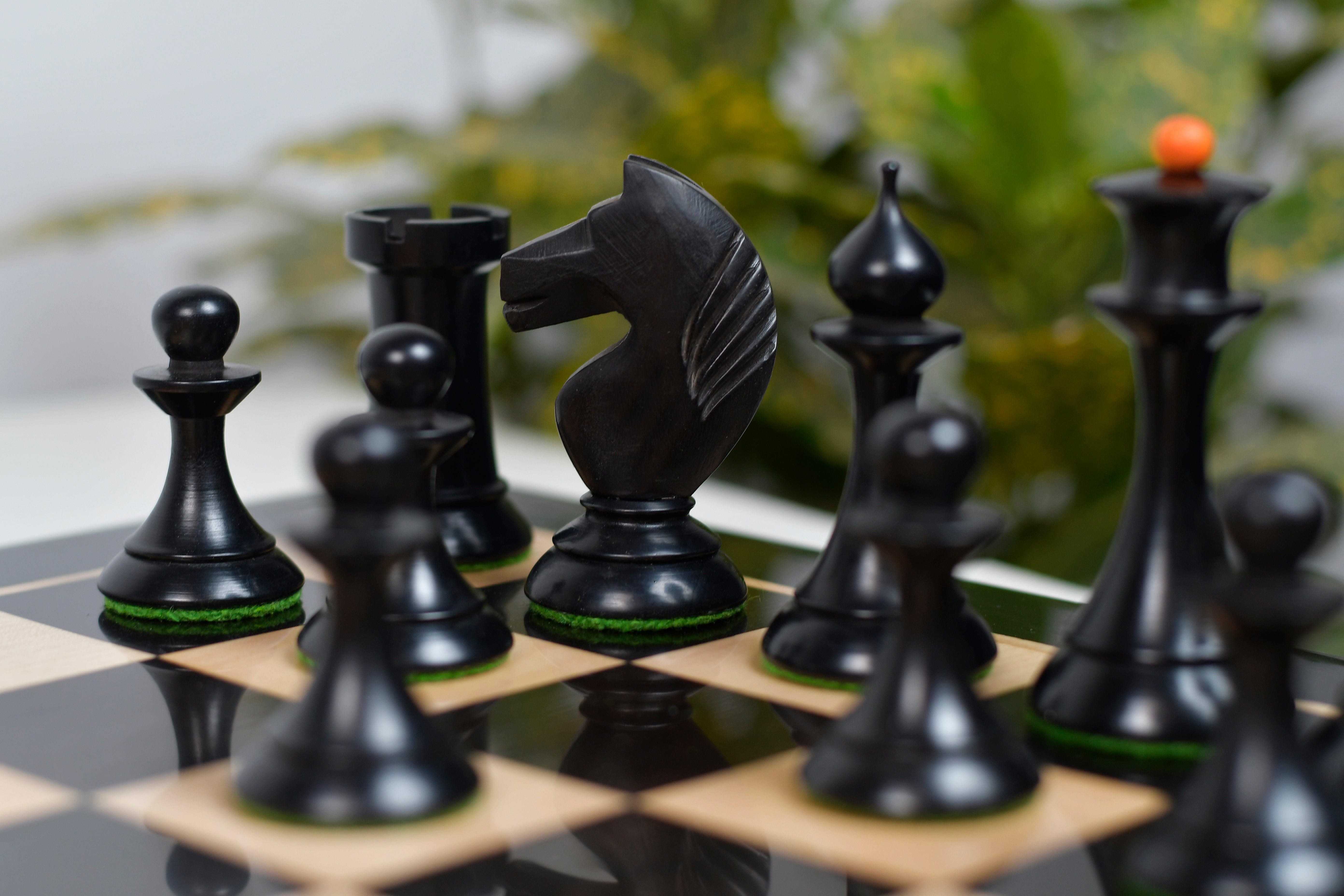 Hand carved knight detail on the 1950s Soviet Latvian Ebonised & Antiqued chess pieces