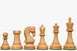 Ebonised chess pieces with a 102mm king and weighted felted bases