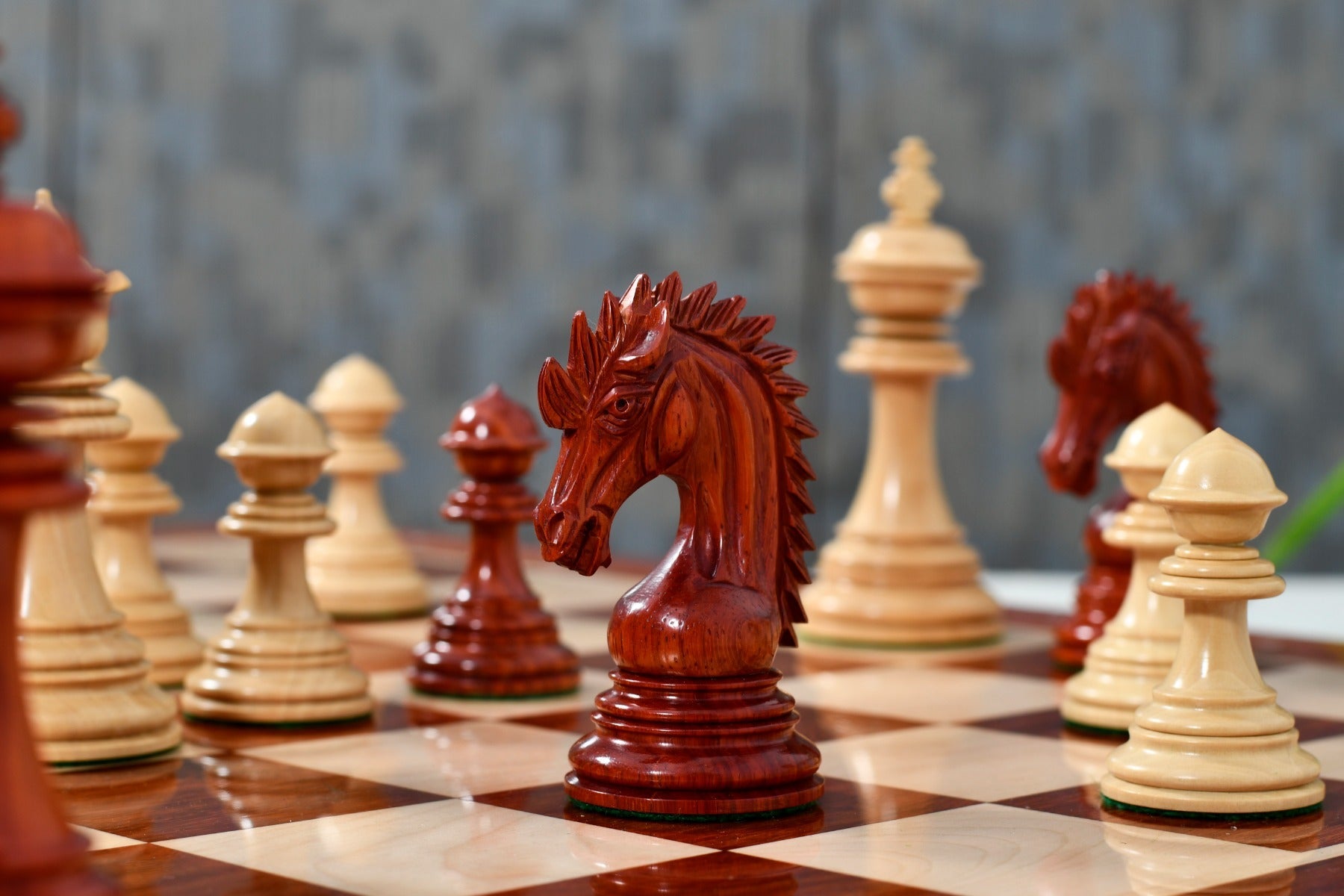 Knight carving detail on the Ferocious Elite Series chess pieces in bud rosewood and boxwood