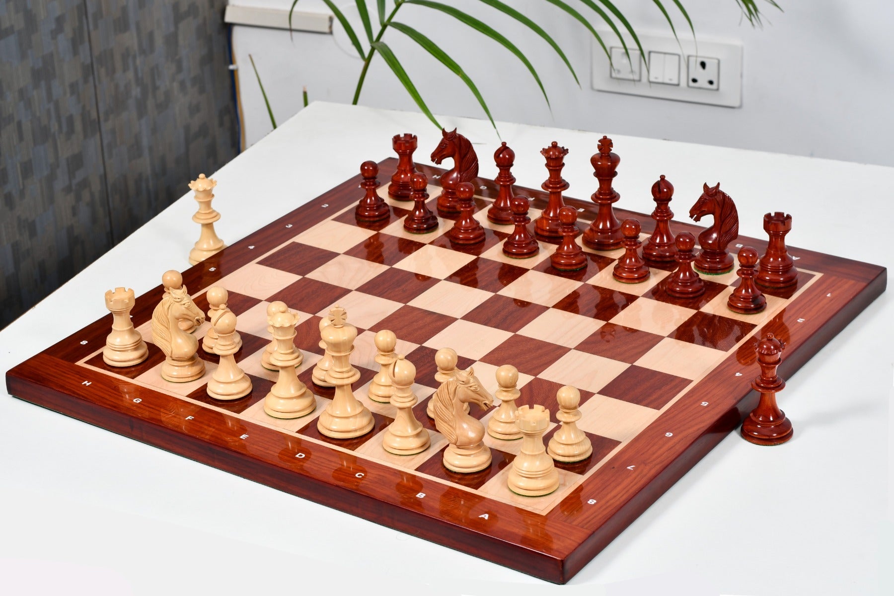 Knight carving detail on the Monarch's Gambit chess pieces in bud rosewood and boxwood