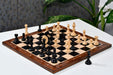 Knight carving detail on the Monarch's Gambit chess pieces in ebony and boxwood